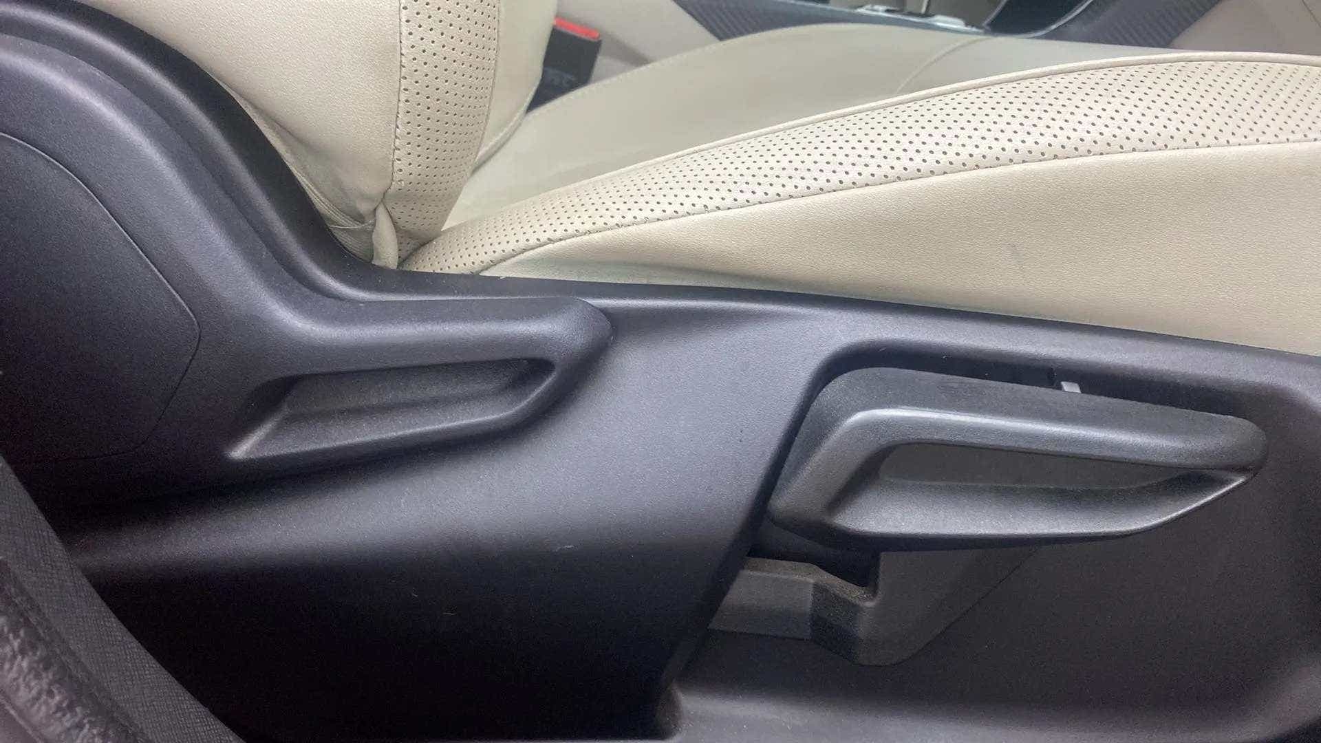 Seat adjustment lever close-up of a Tata Nexon 2017-2023