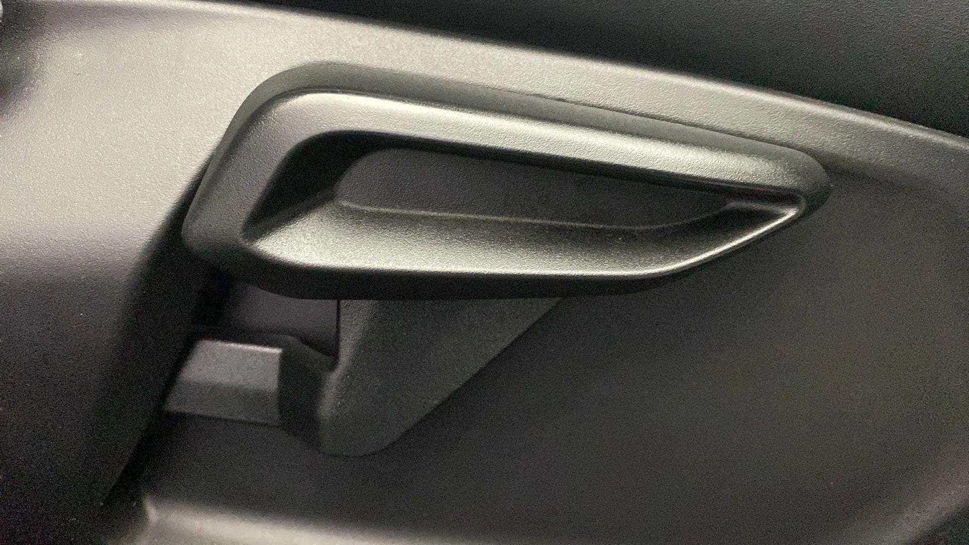 Close-up of a door handle of a Tata Nexon 2017-2023