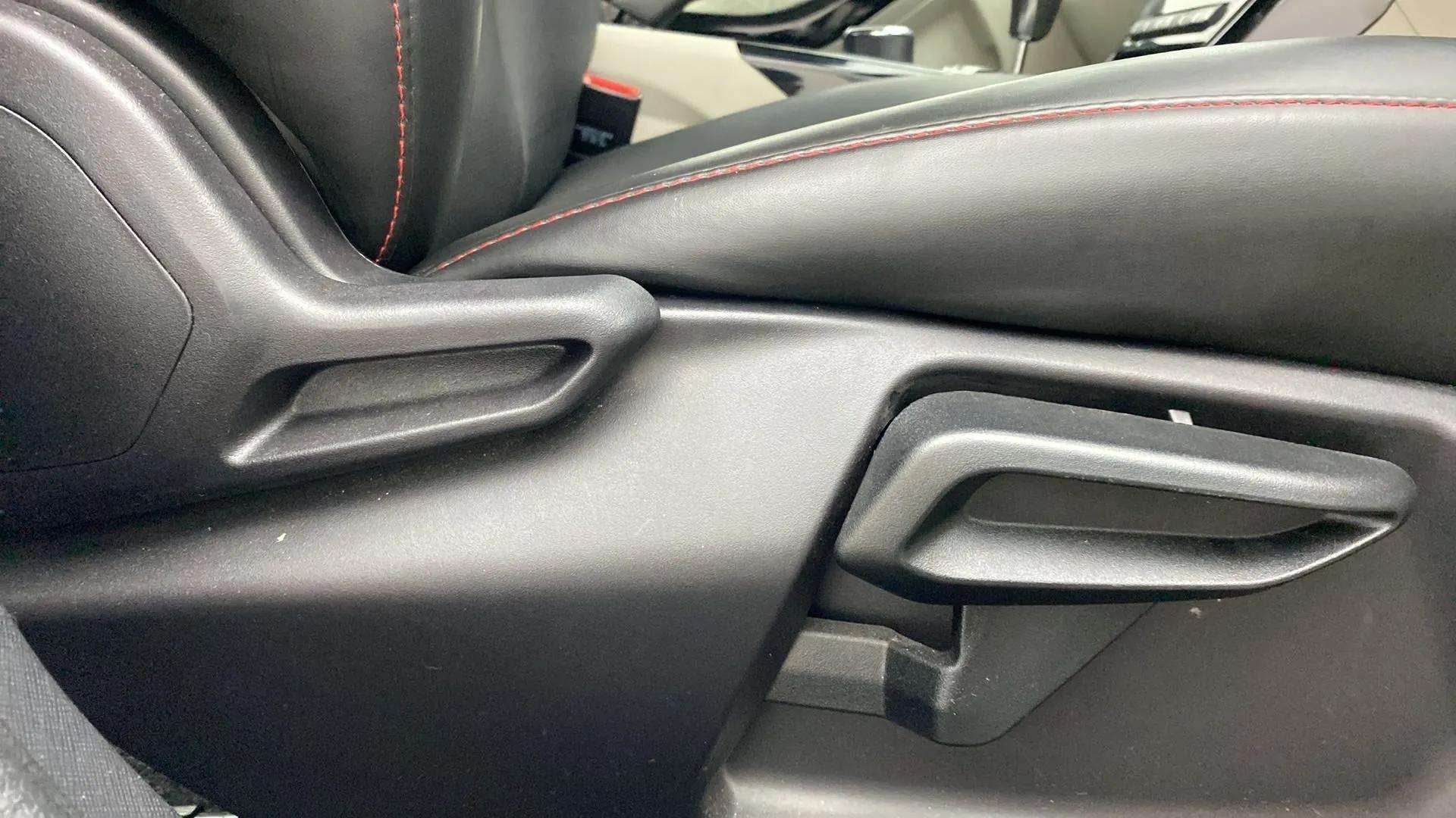 Seat adjustment lever area of a Tata Nexon 2017-2023