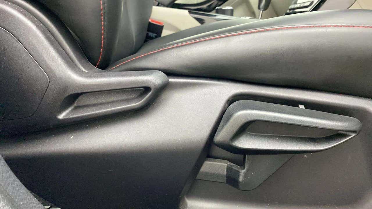 Seat adjustment lever area of a Tata Nexon 2017-2023