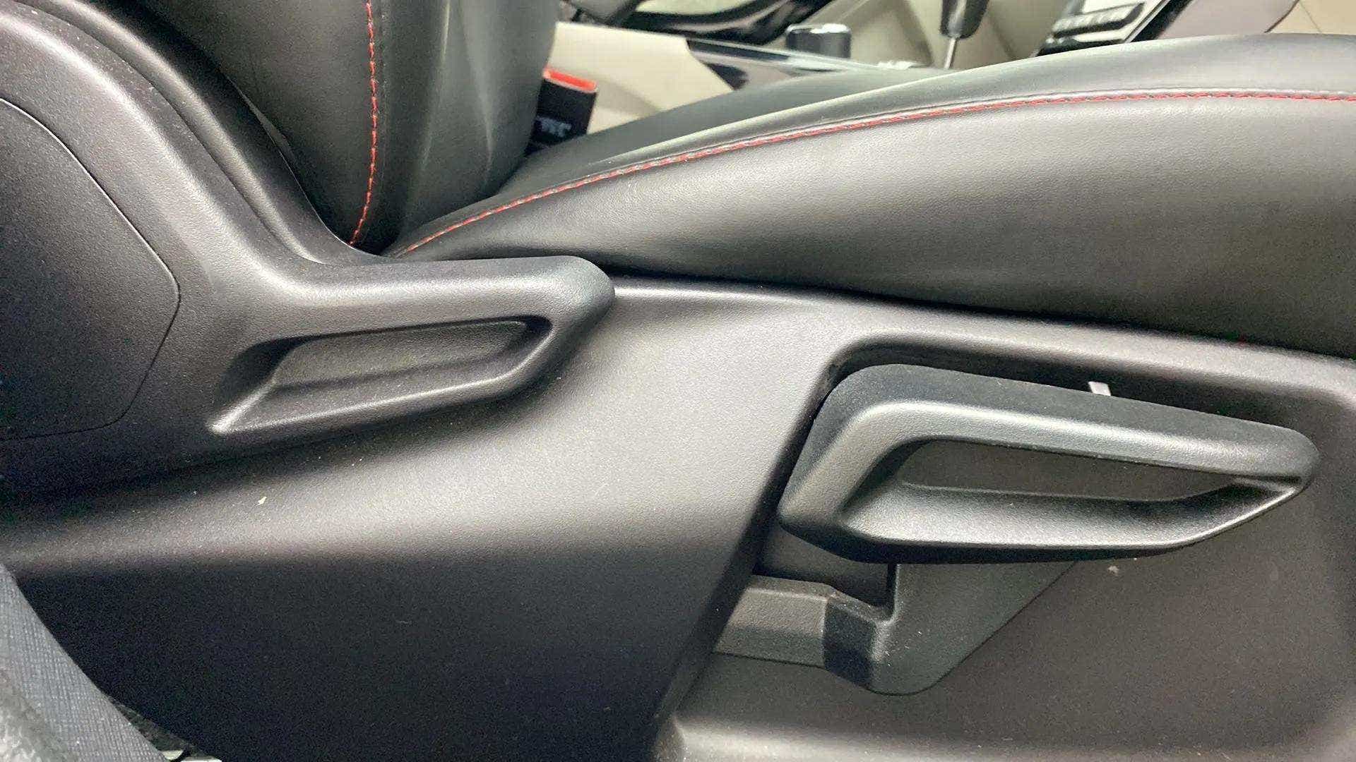 Seat adjustment lever area of a Tata Nexon 2017-2023