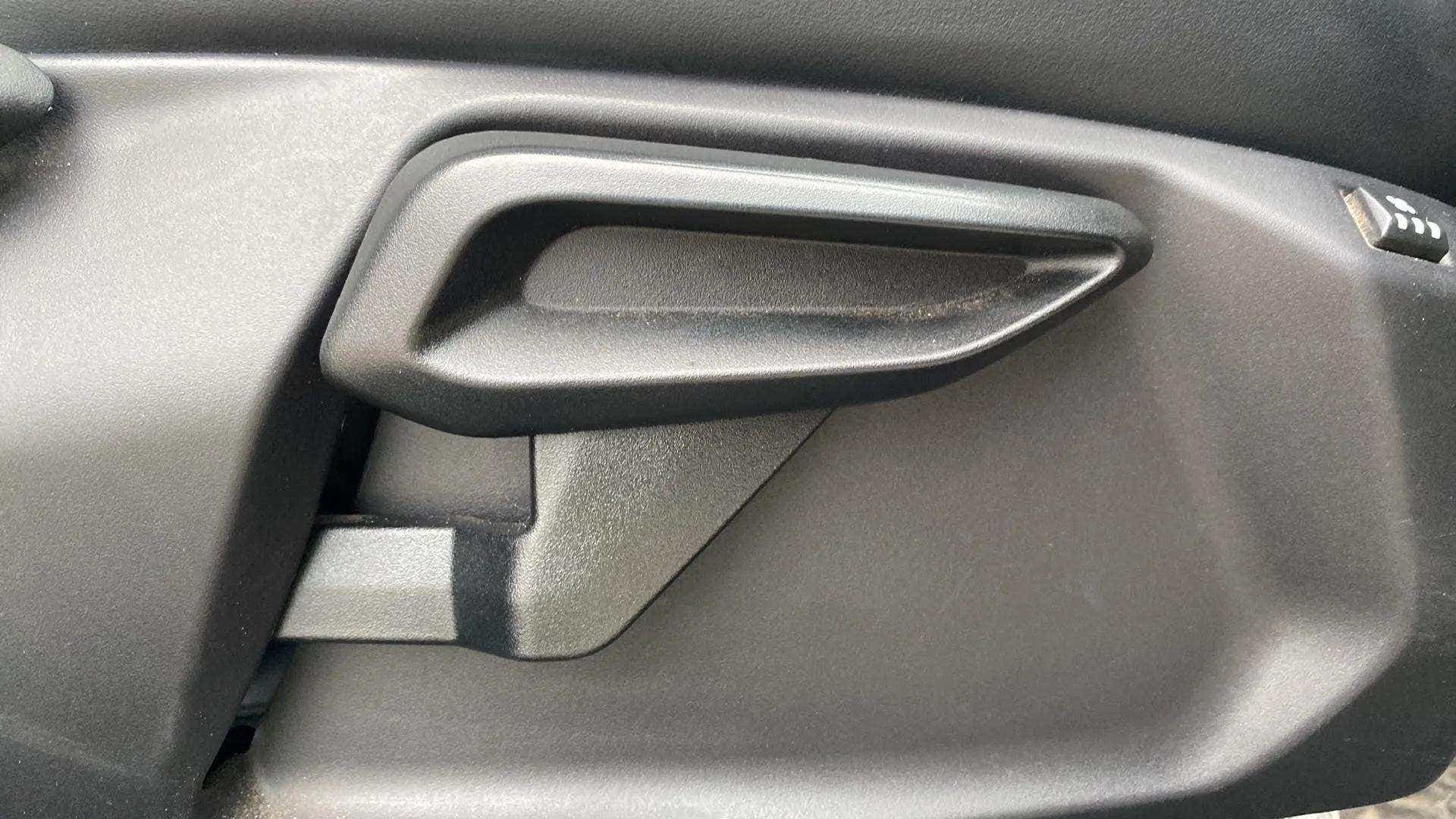 Interior door handle of a Tata Nexon 2017-2023
