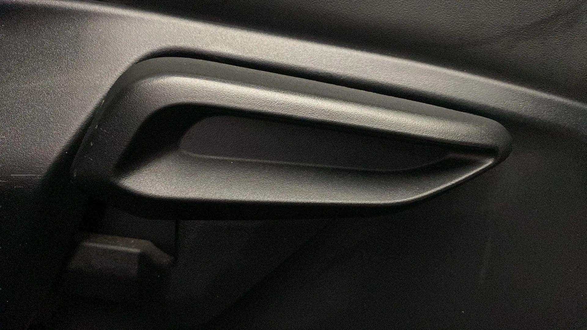 Close-up of the door handle of a Tata Nexon