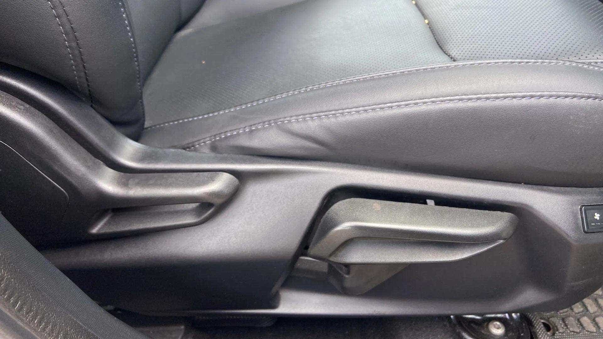 Driver seat adjustment controls of a Tata Nexon