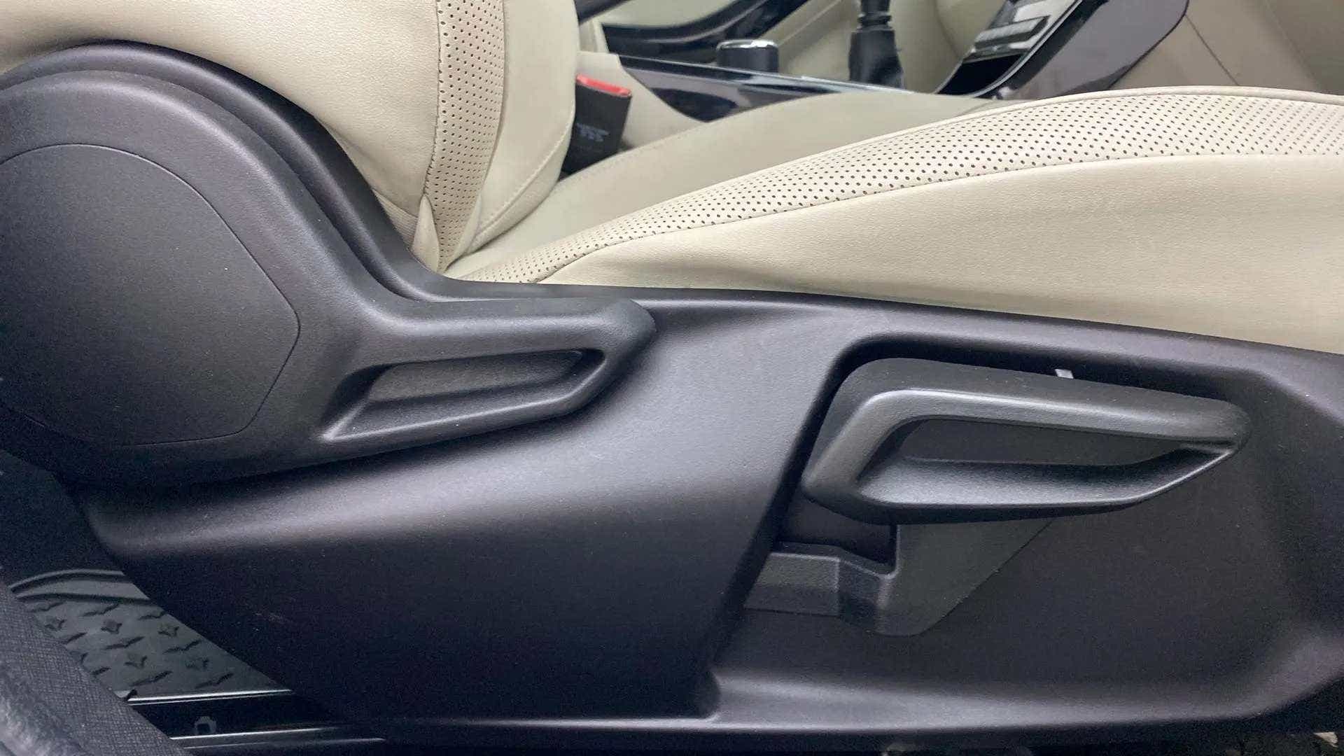 Driver seat adjustment lever of a Tata Nexon 2017-2023