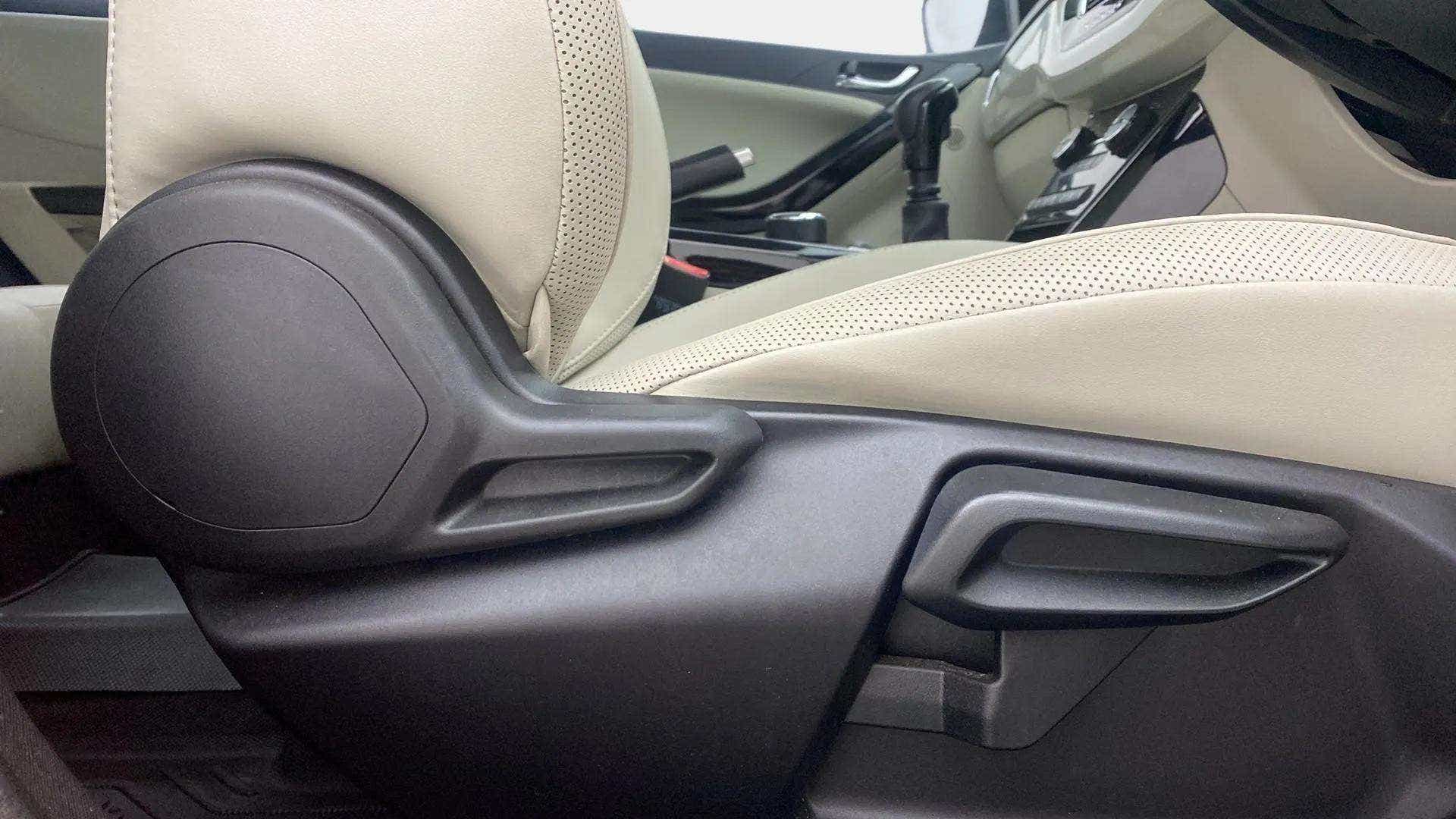 Front seat adjustment controls of a Tata Nexon 2017-2023