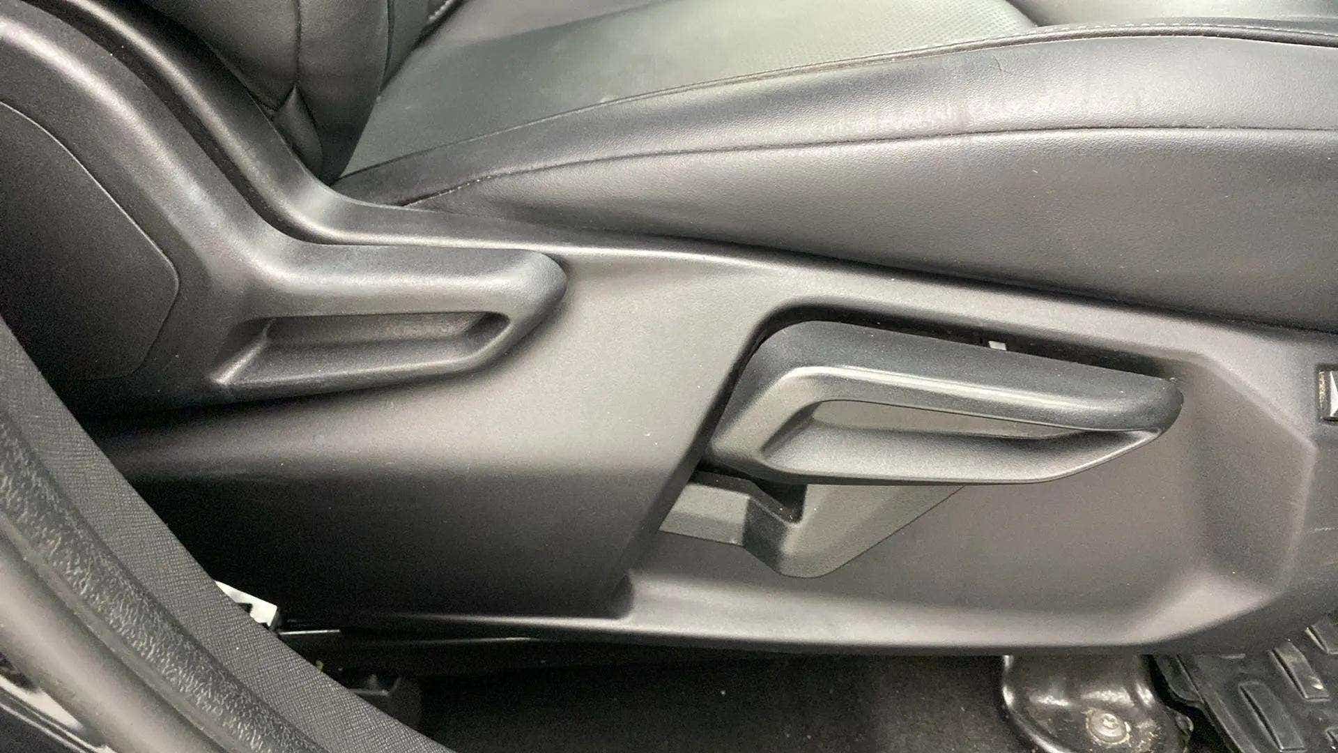 Driver seat adjustment lever of a Tata Nexon 2017-2023