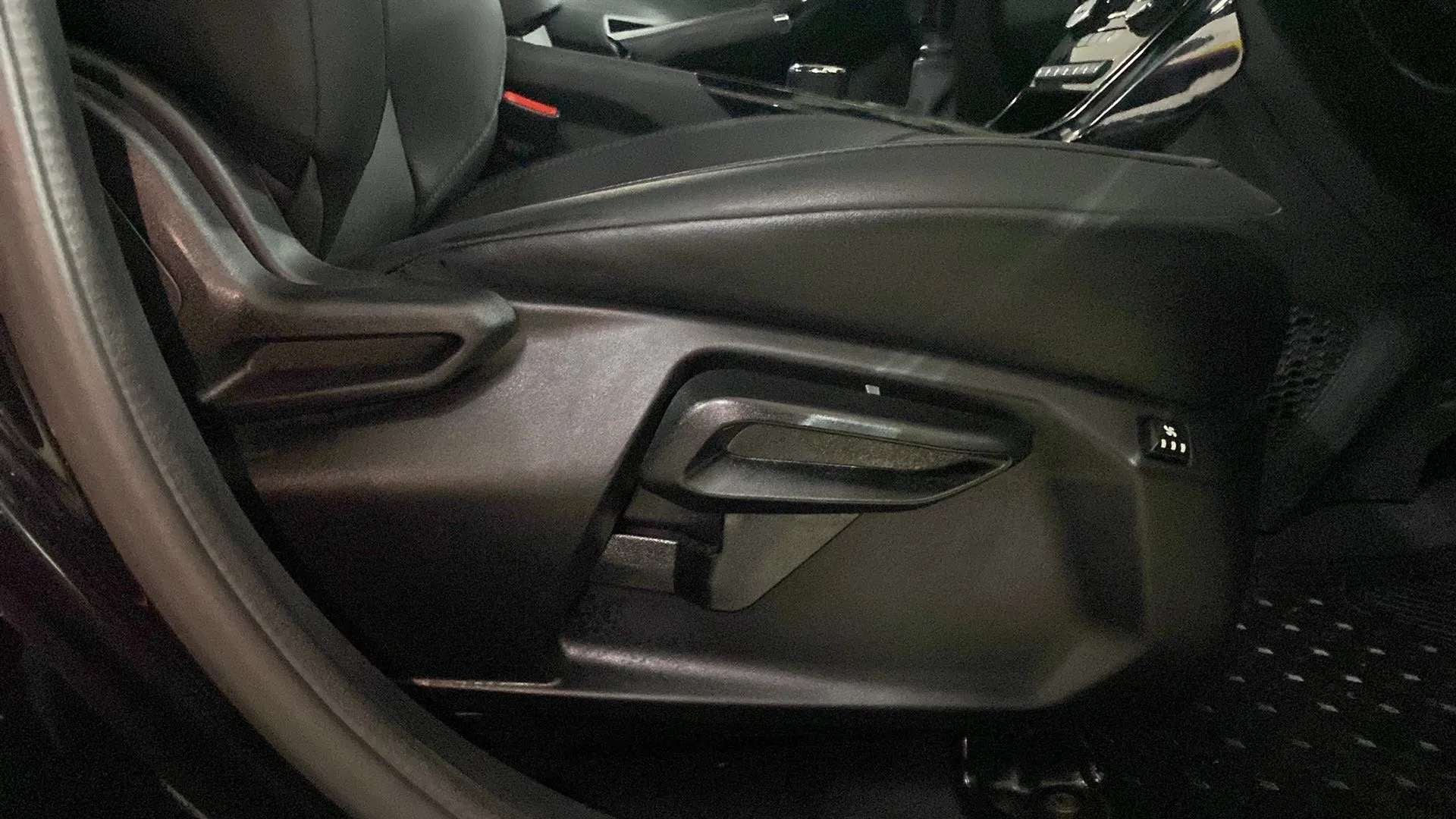 Driver seat adjustment controls of a Tata Nexon 2017-2023