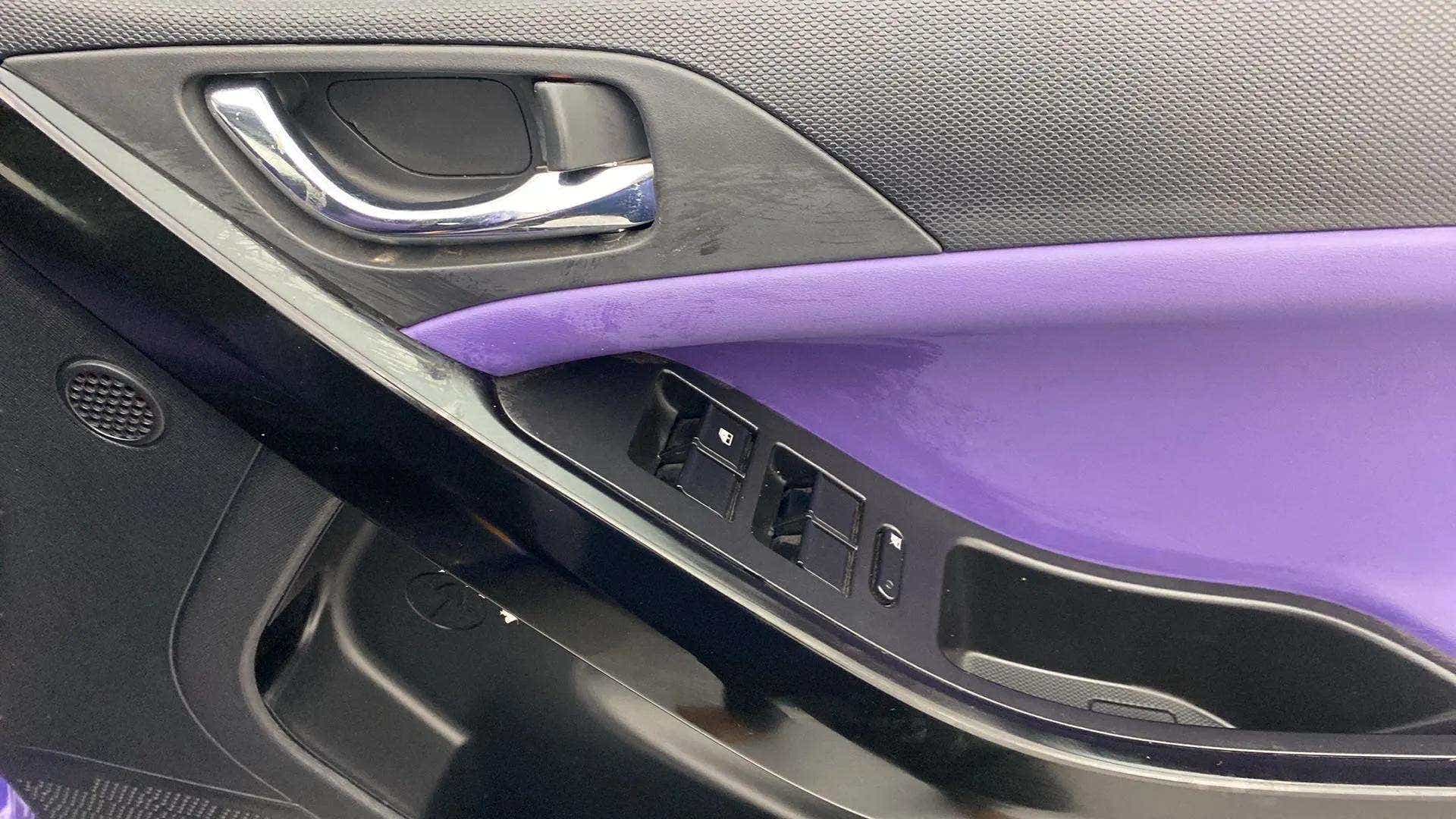Driver side interior door panel of a Tata Nexon 2017-2023