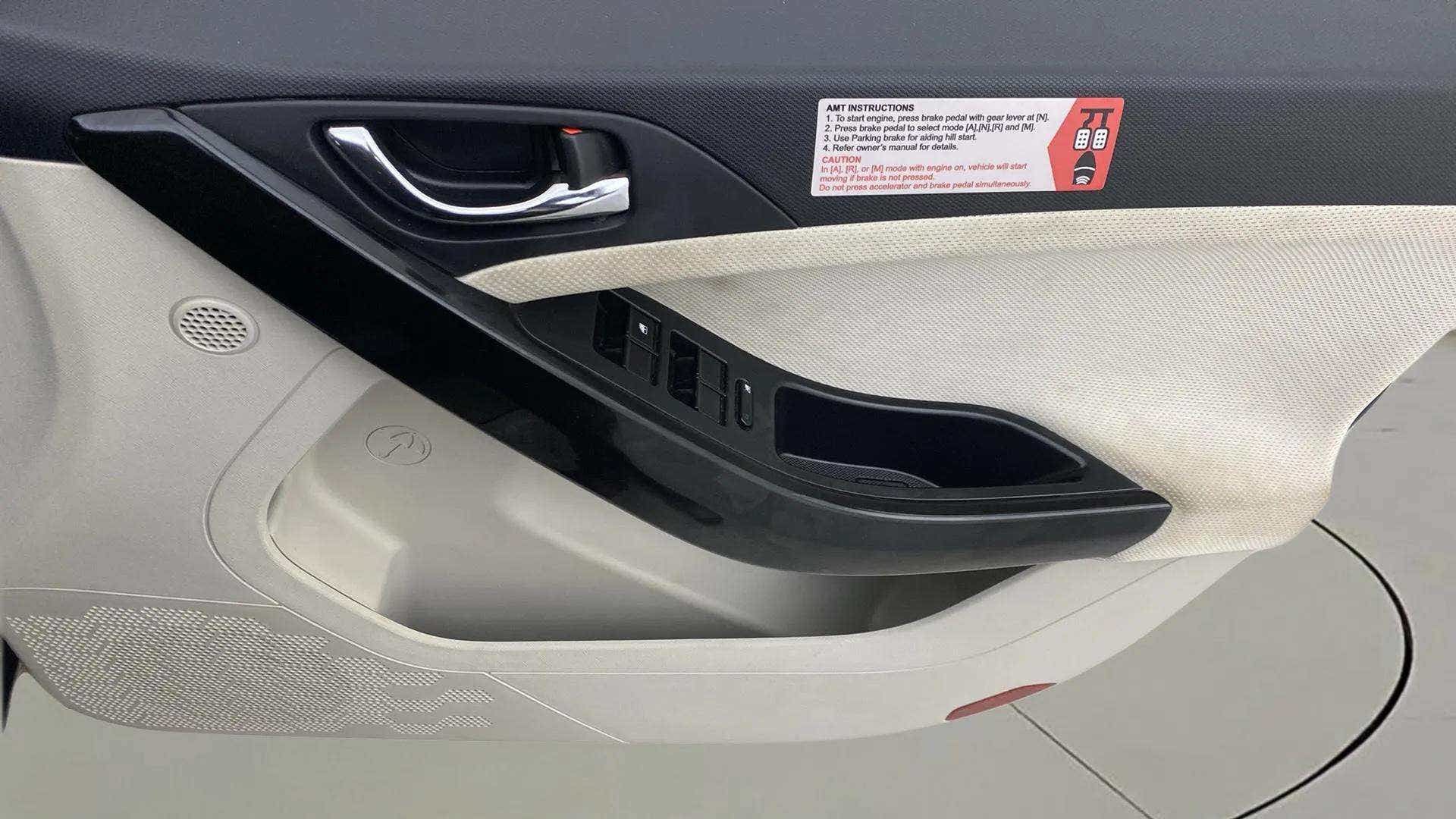 Interior driver side door panel of a Tata Nexon 2017-2023