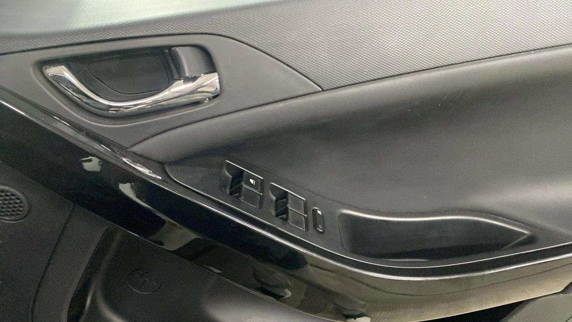 Interior driver side door panel of a Tata Nexon 2017-2023