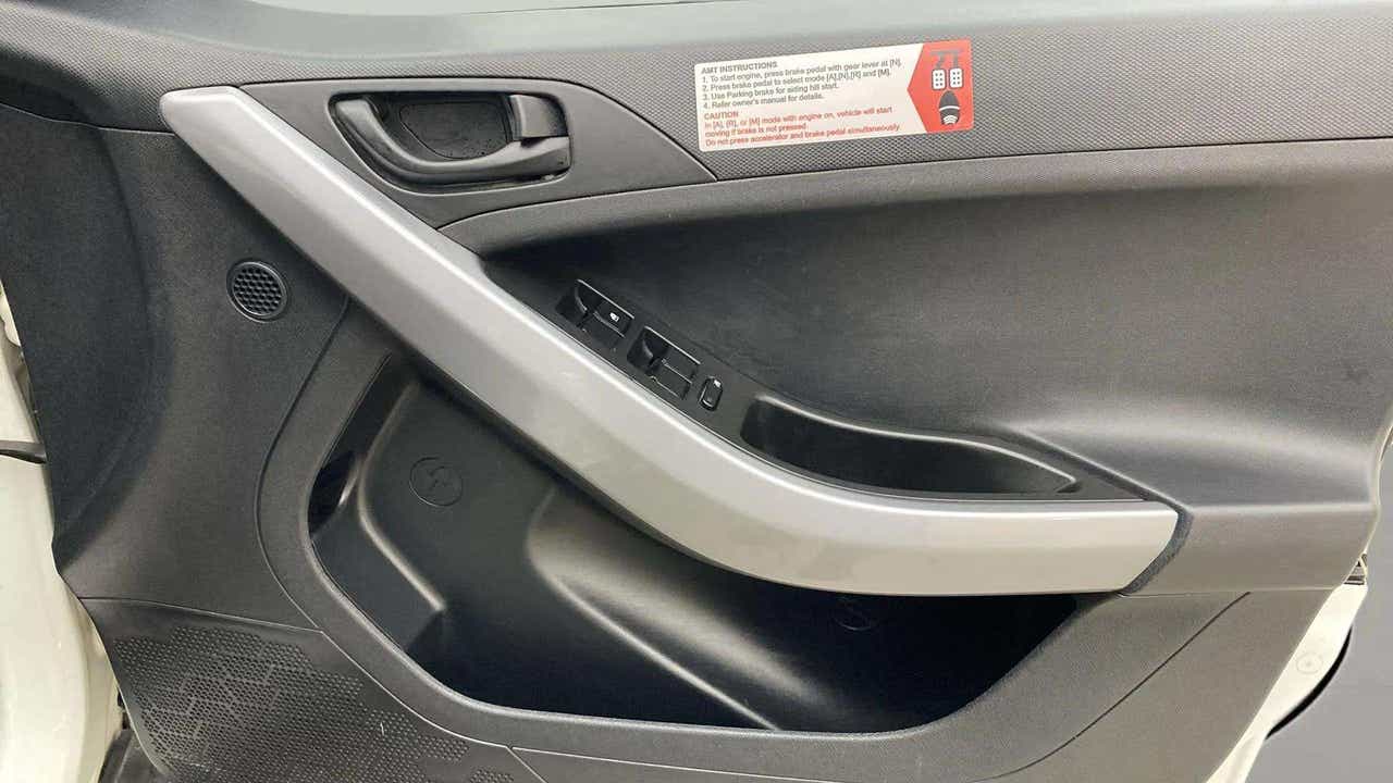 Interior front door panel of a Tata Nexon 2017-2023
