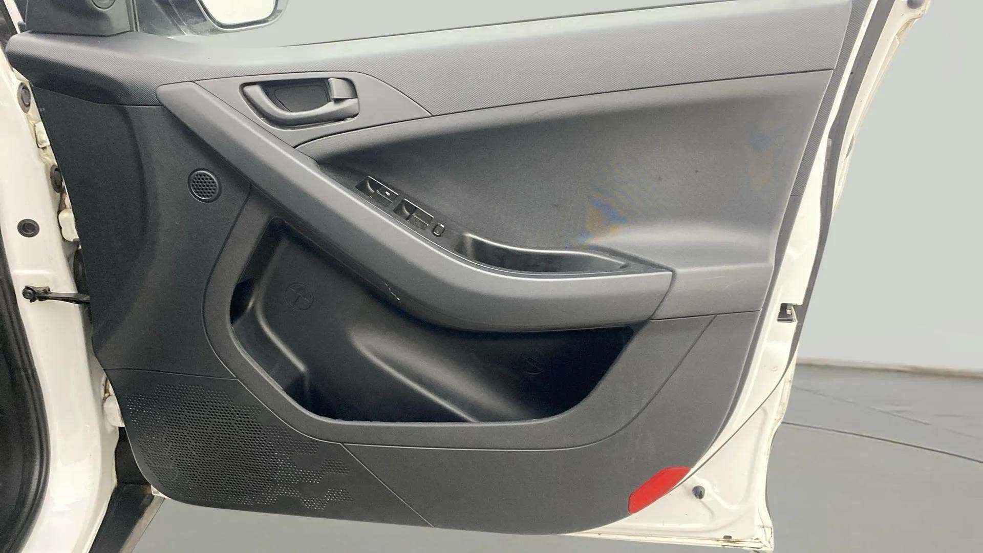 Driver side interior door panel of a Tata Nexon