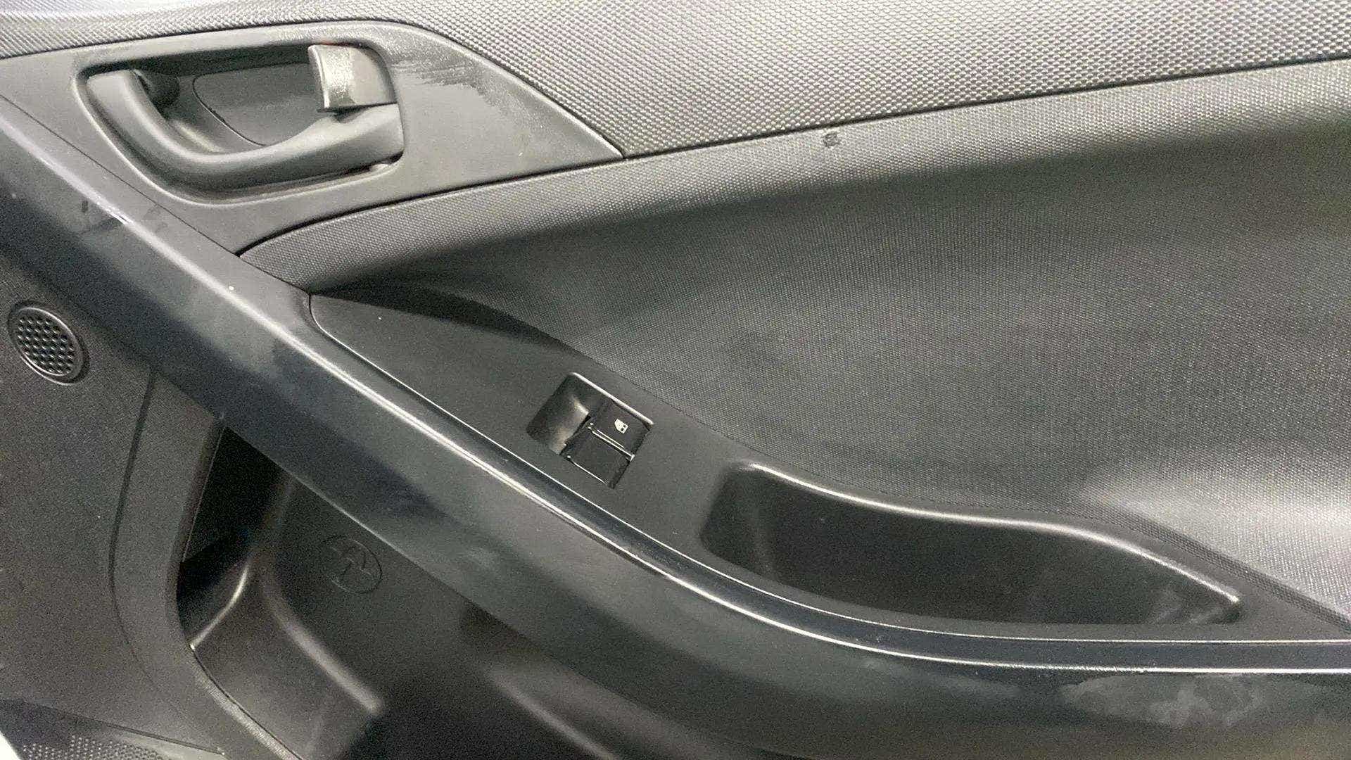 Interior driver side door panel of a Tata Nexon