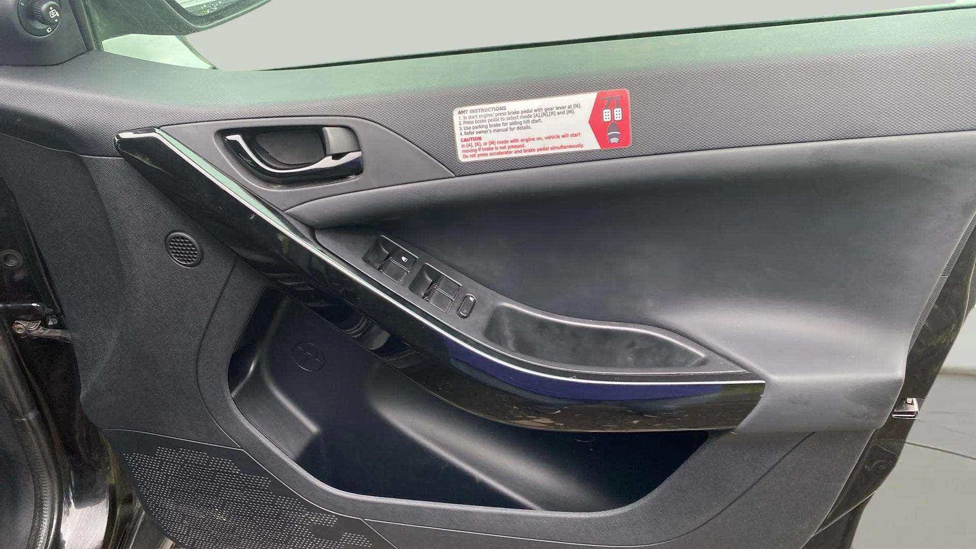 Interior front door panel of a Tata Nexon 2017-2023