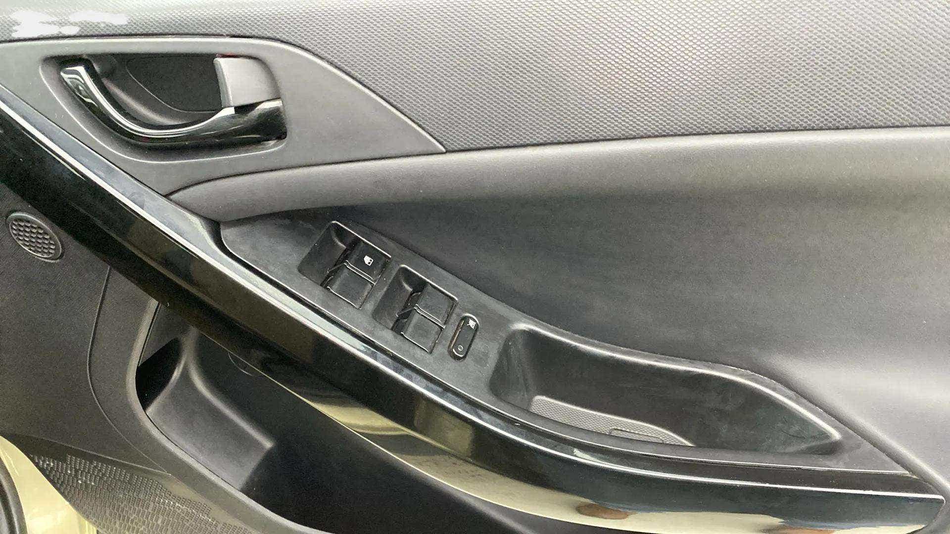 Close-up of the interior door controls of a Tata Nexon 2017-2023