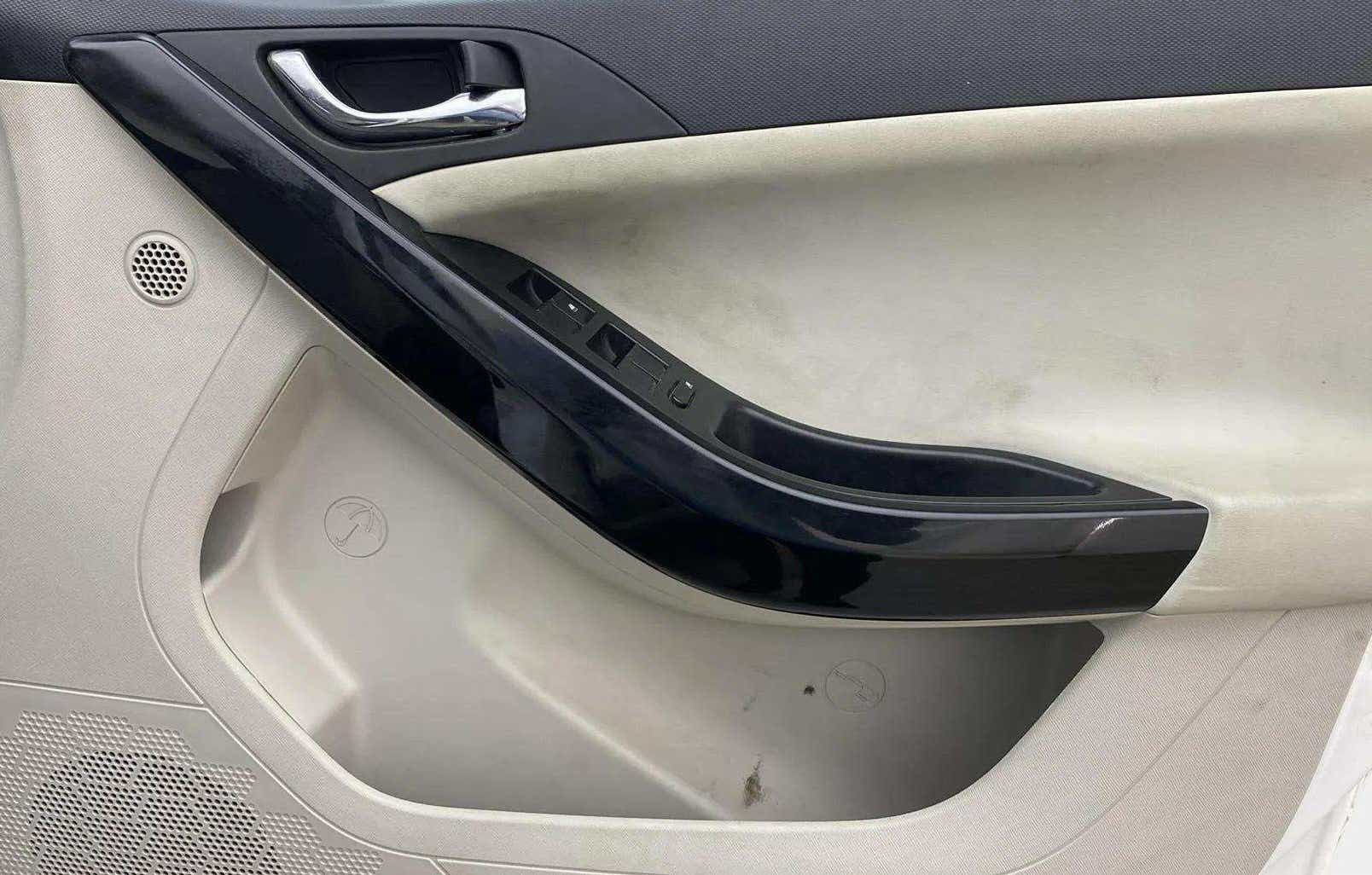 Interior driver door panel of a Tata Nexon 2017-2023