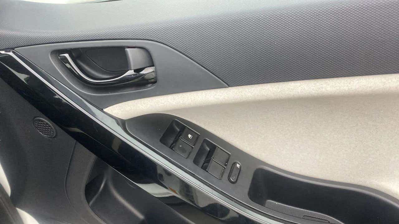 Interior door panel and controls of a Tata Nexon