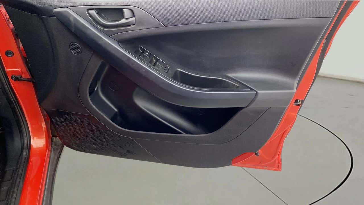 Interior front door panel of a Tata Nexon