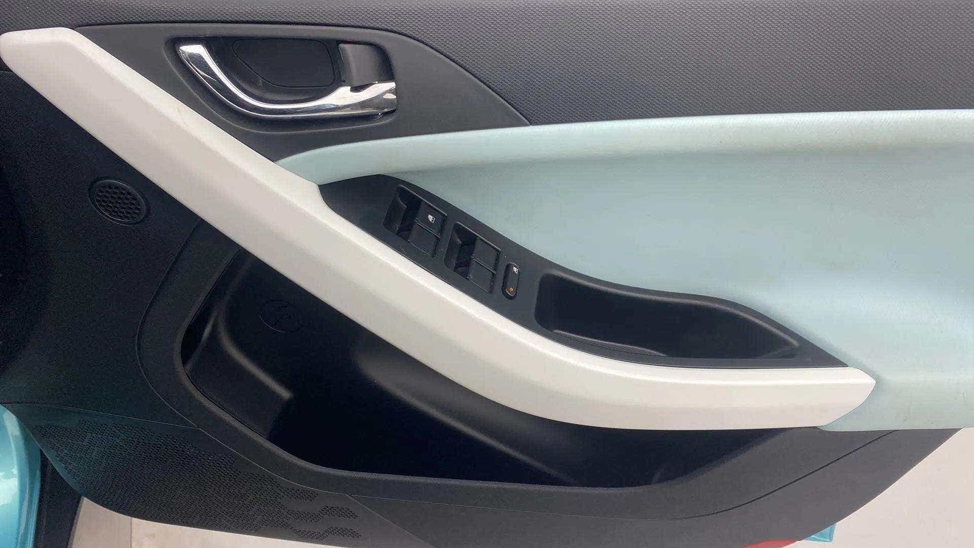 Front door panel and controls of a Tata Nexon
