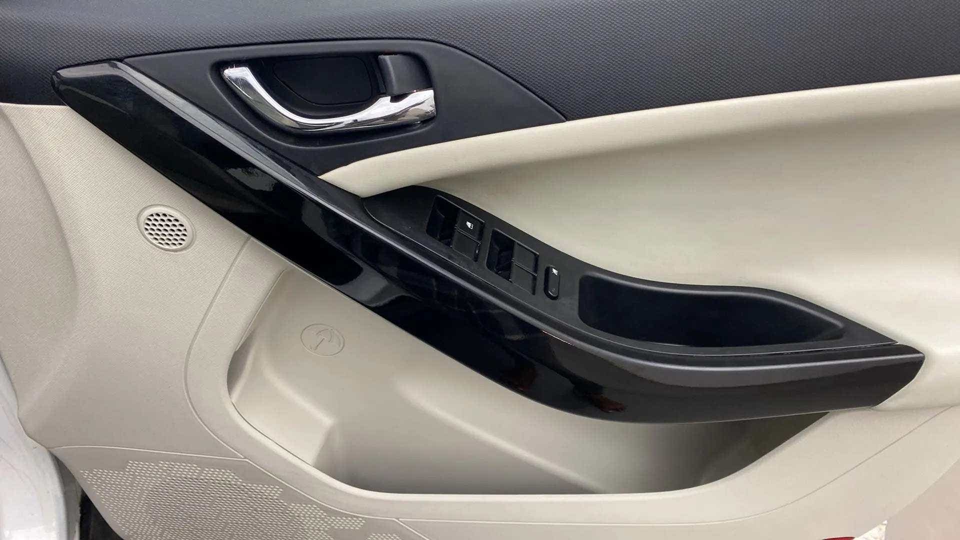 Front door panel and window controls of a Tata Nexon 2017-2023