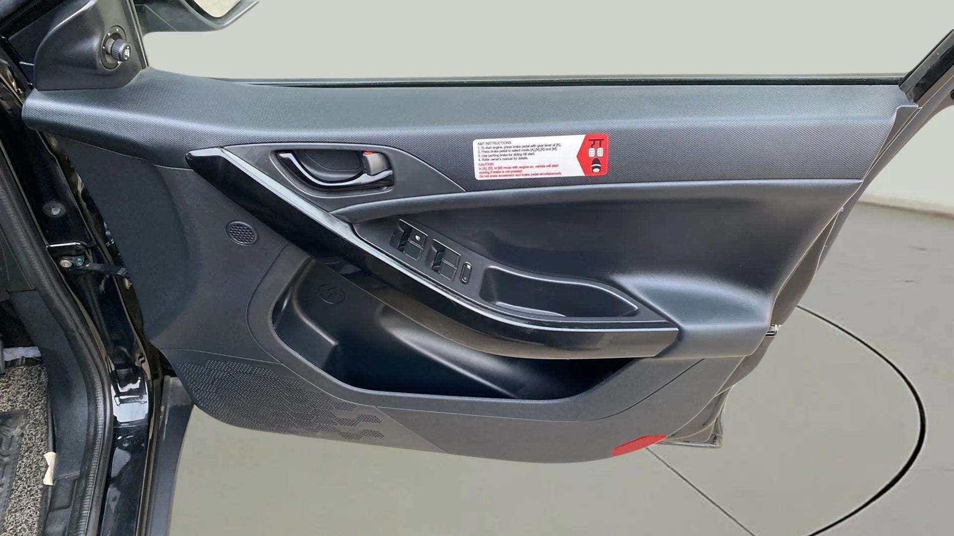 Interior front door panel of a Tata Nexon 2017-2023