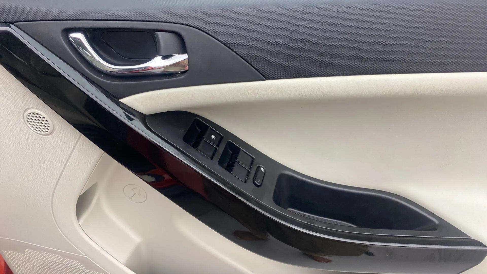 Driver side interior door panel of a Tata Nexon 2017-2023
