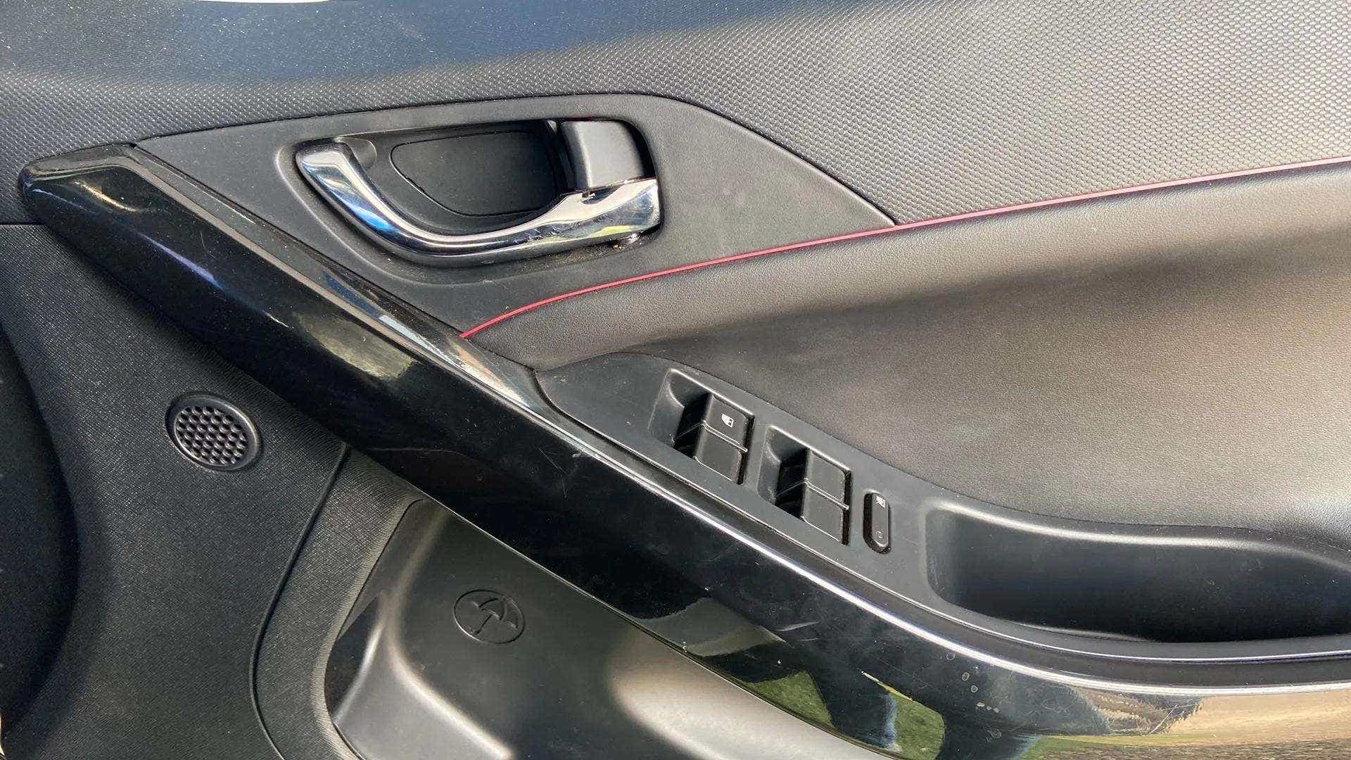 Door panel and controls of a Tata Nexon 2017-2023