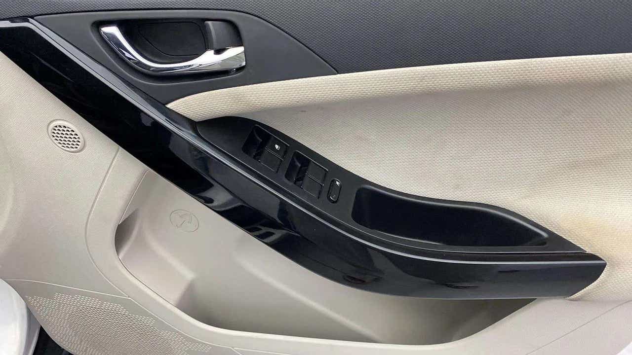Interior driver side door panel of a Tata Nexon 2017-2023