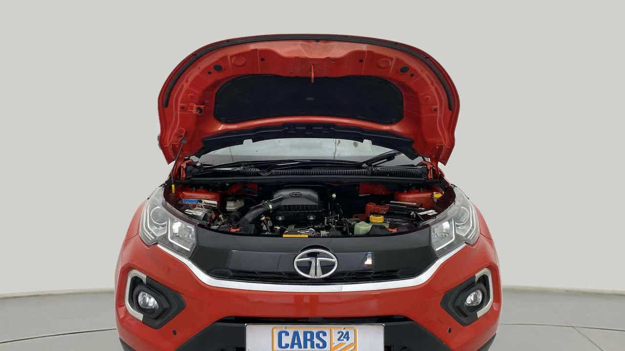 Engine bay view of a flame red Tata Nexon 2017-2023