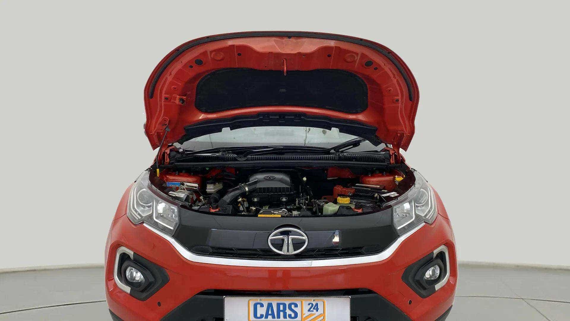 Engine bay view of a flame red Tata Nexon 2017-2023