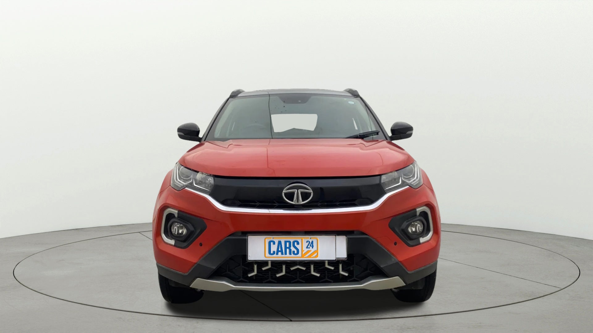 Front view of a Flame Red Tata Nexon 2017-2023