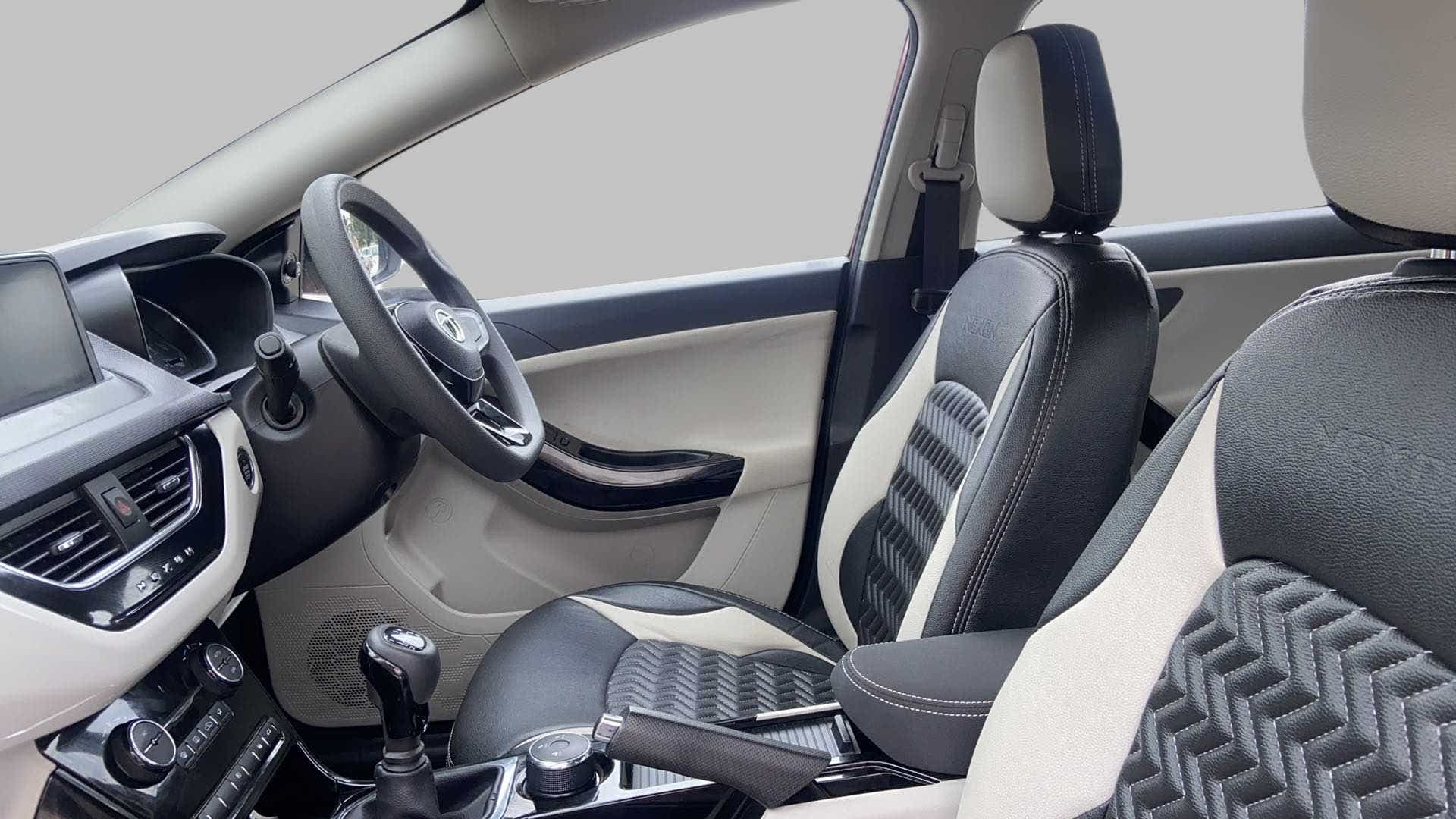 Interior dashboard and front seats of a Tata Nexon 2017-2023