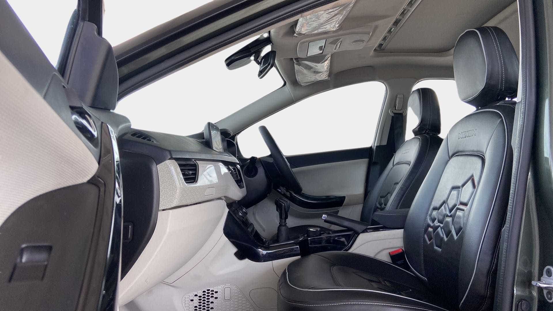 Interior front seats and dashboard of a Tata Nexon 2017-2023