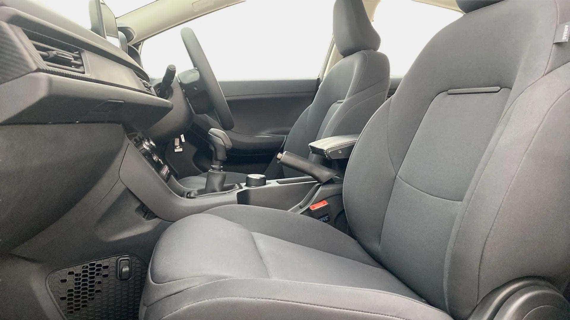 Front seats and dashboard of a Tata Nexon interior