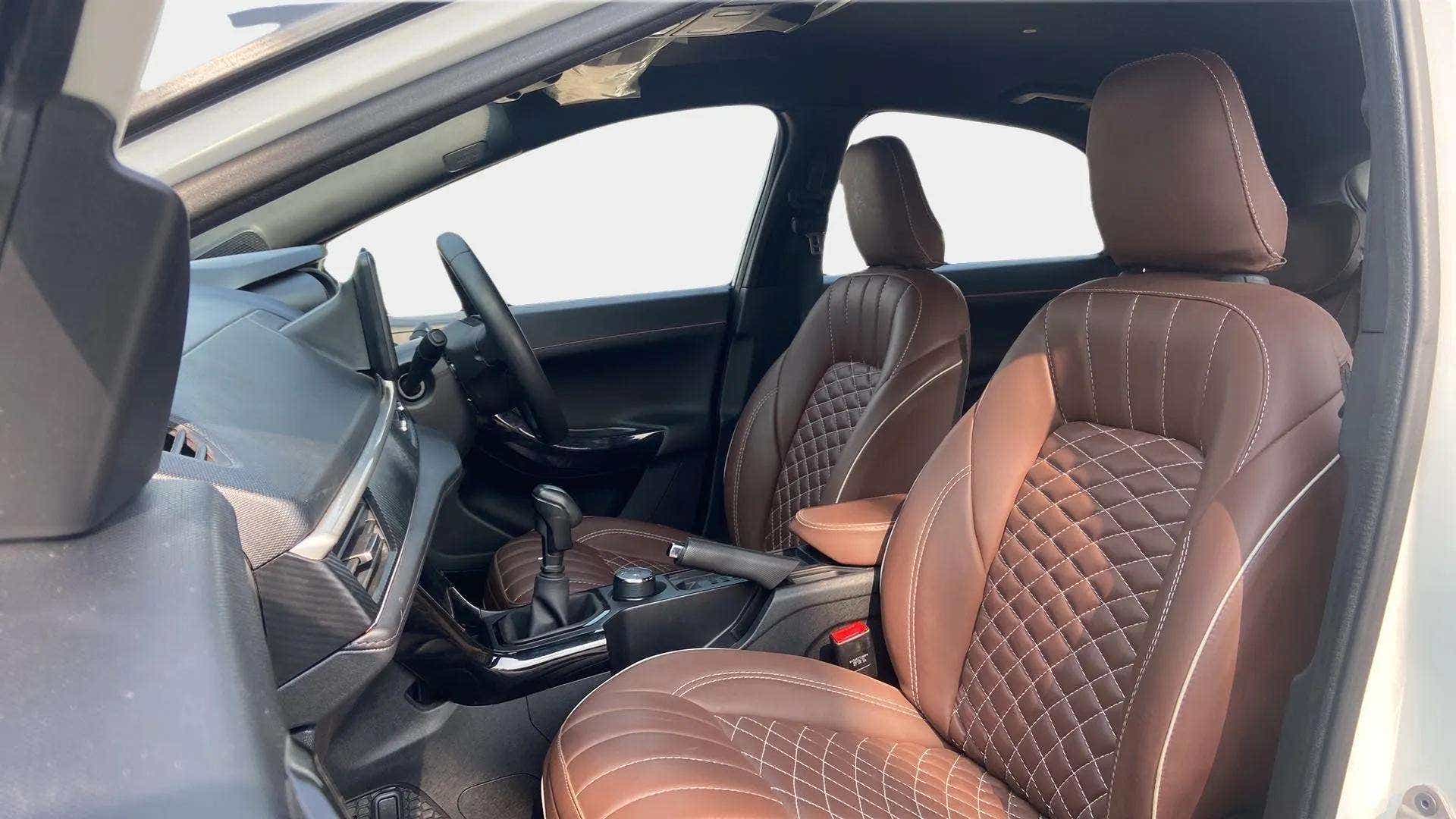 Interior front seats and dashboard of a Tata Nexon 2017-2023