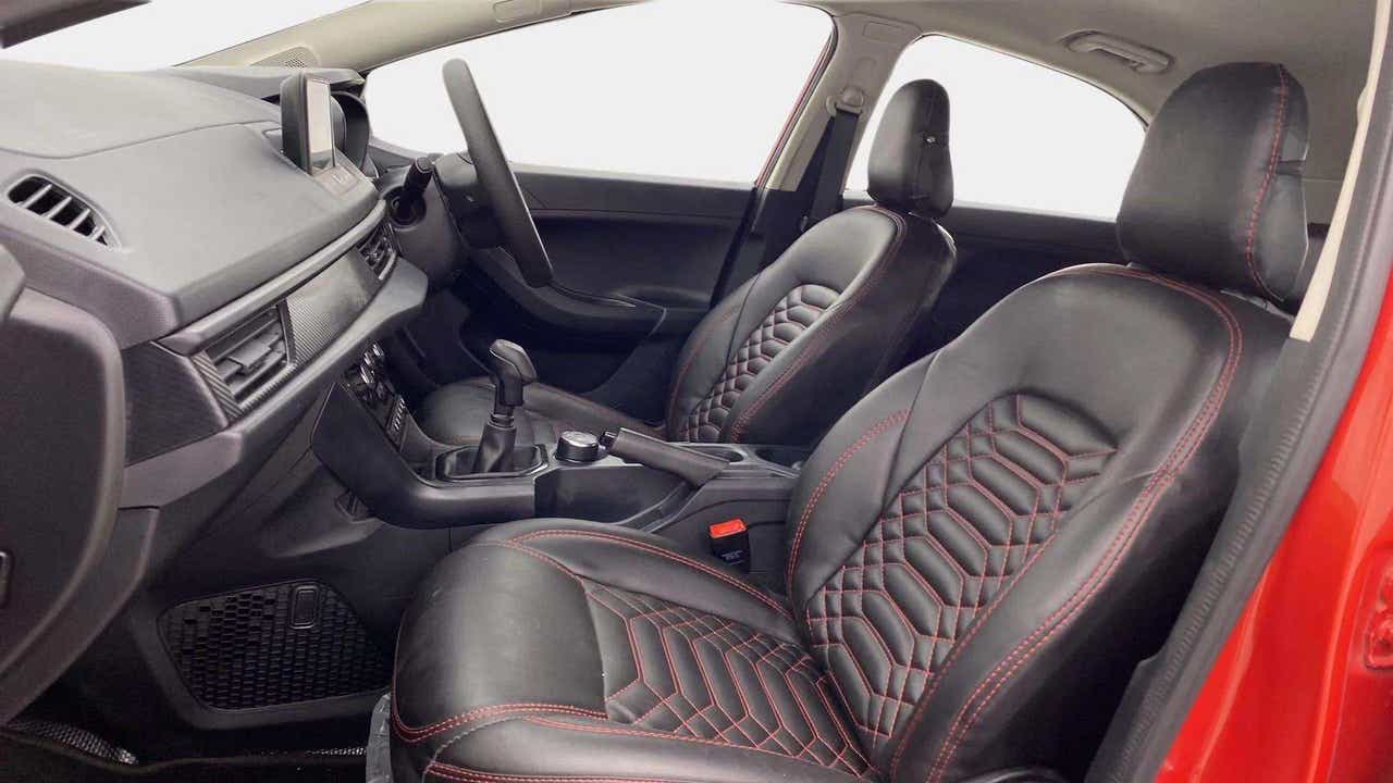 Interior front seats and dashboard of a Tata Nexon