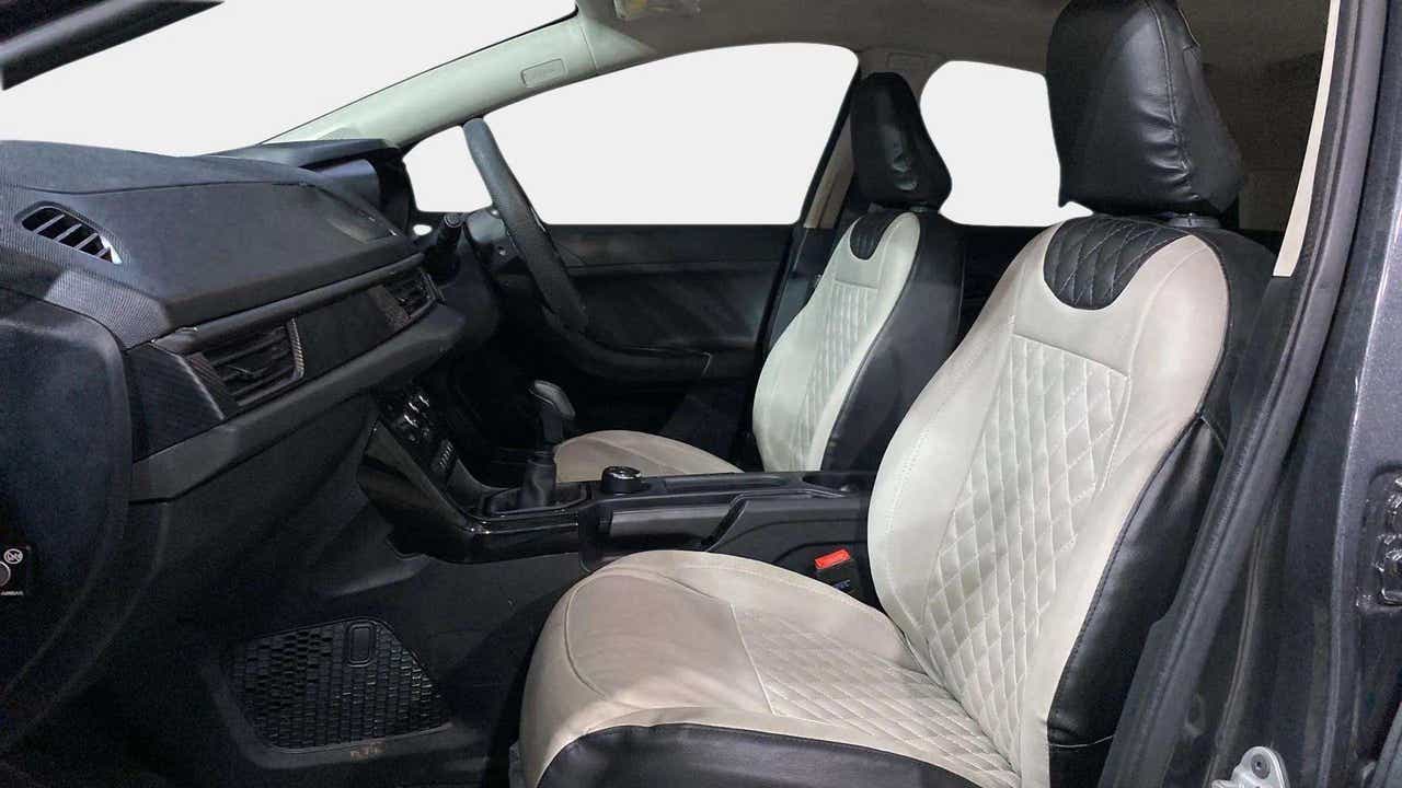 Interior front seats and dashboard of a Tata Nexon