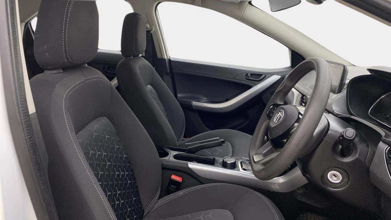 Interior dashboard and front seats of a Tata Nexon 2017-2023