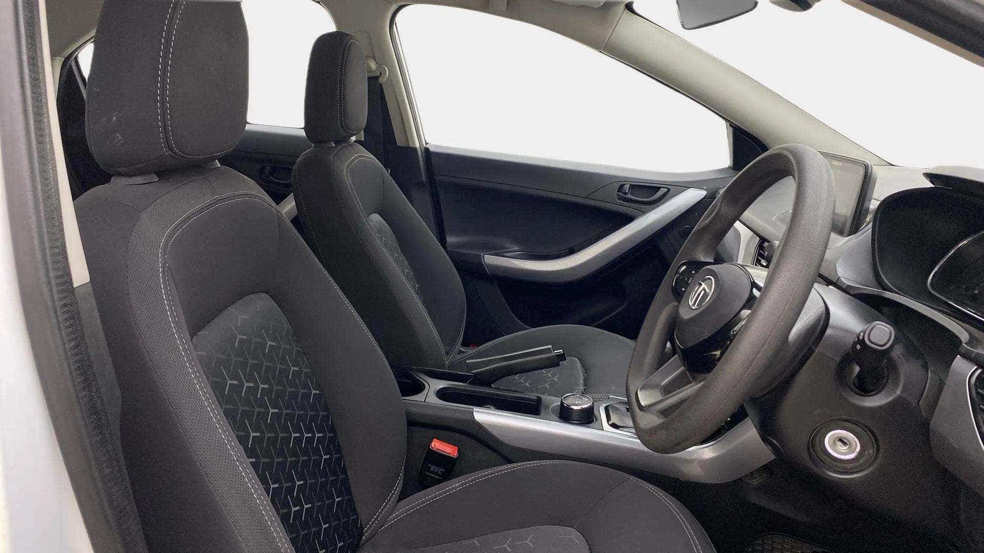 Interior dashboard and front seats of a Tata Nexon 2017-2023