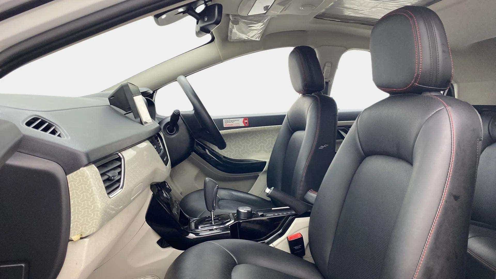 Interior dashboard and front seats of a Tata Nexon 2017-2023
