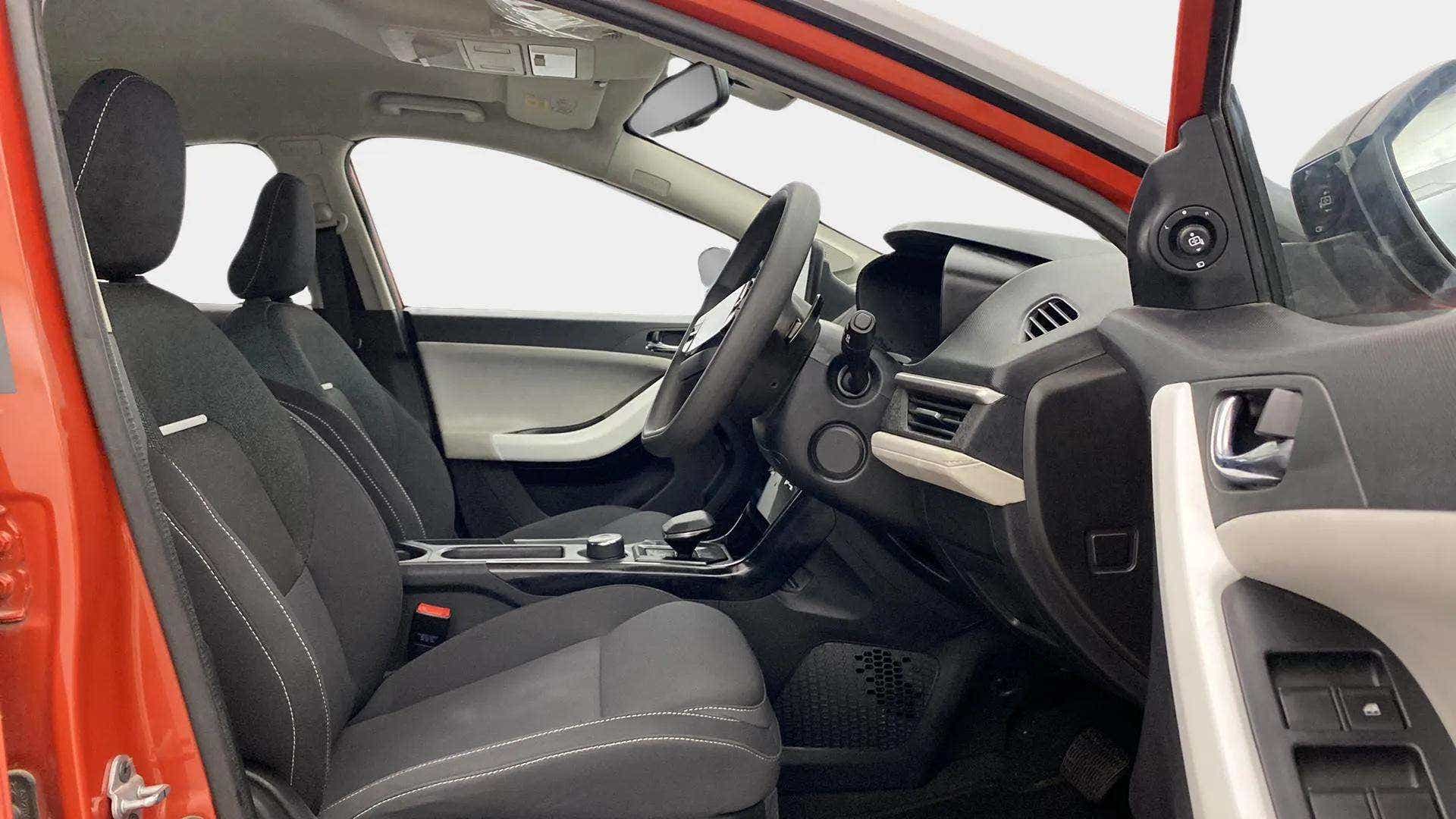 Interior front seats and dashboard view of a Tata Nexon