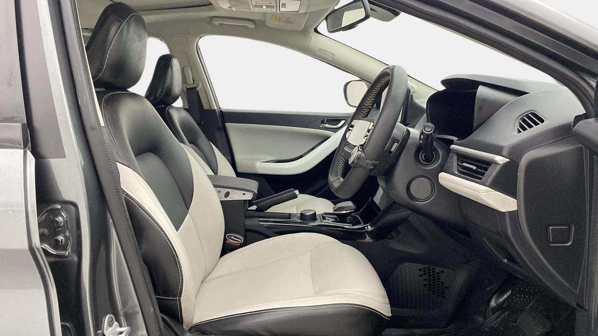 Interior front seats and dashboard of a Tata Nexon