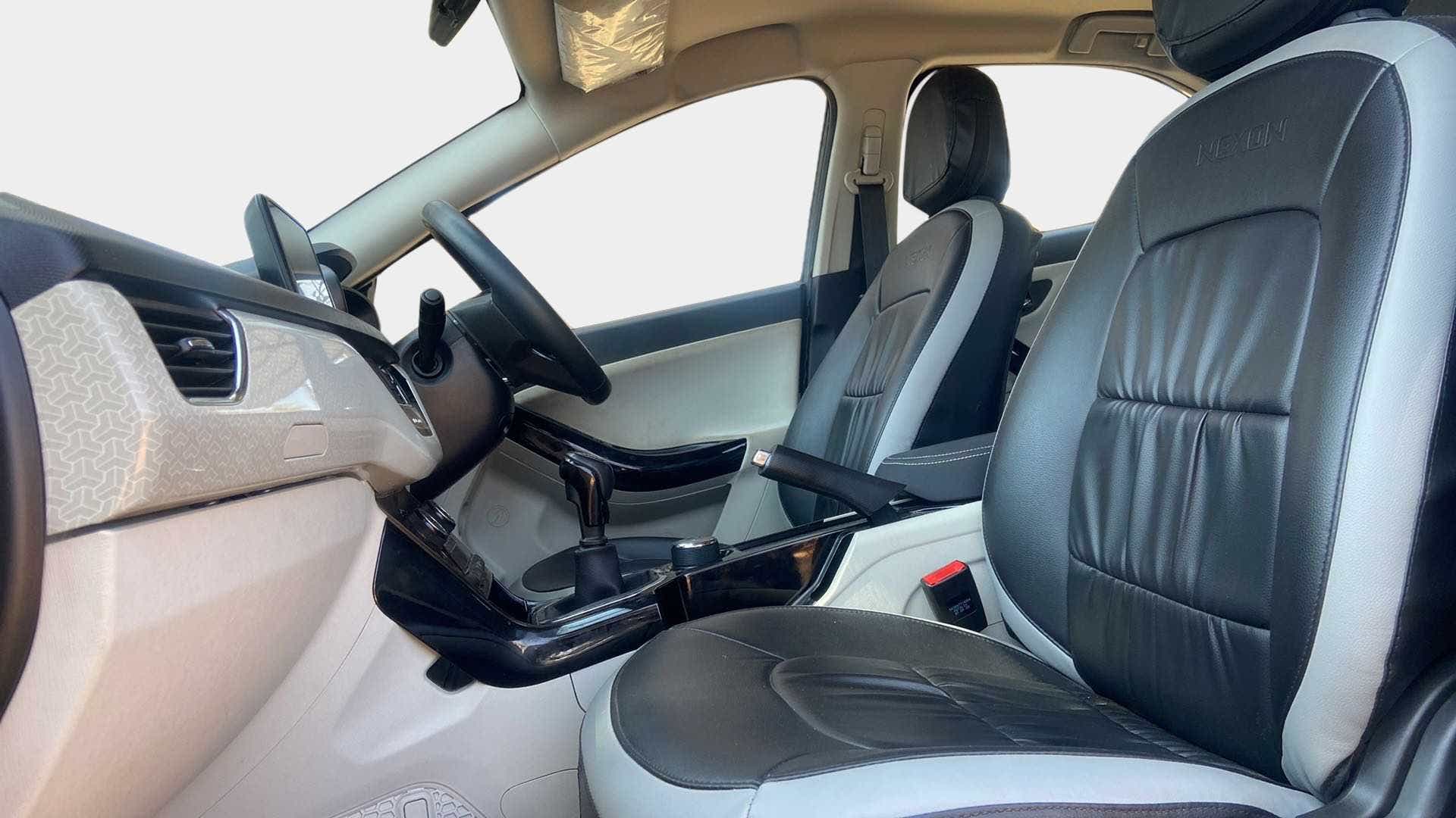 Front seat and dashboard view of a Tata Nexon 2017-2023