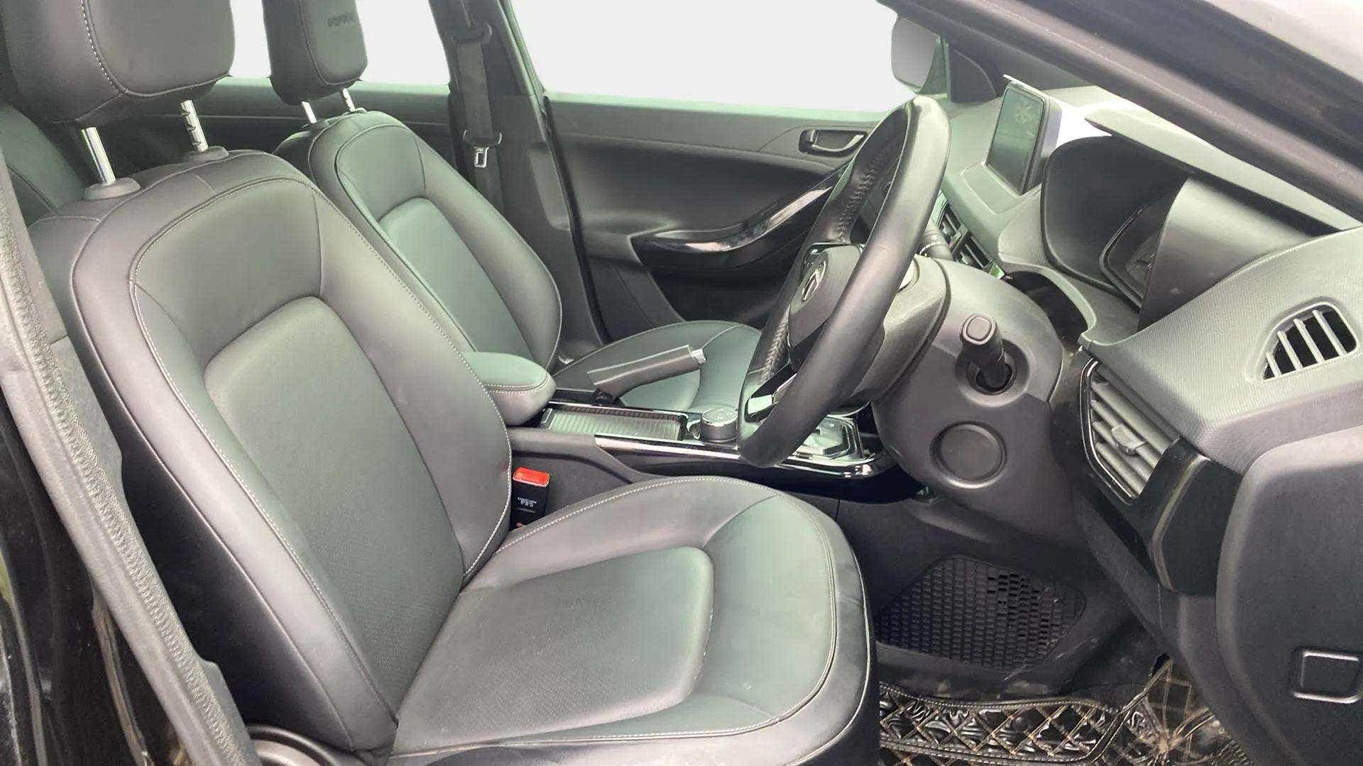 Interior dashboard and front seats of a Tata Nexon 2017-2023