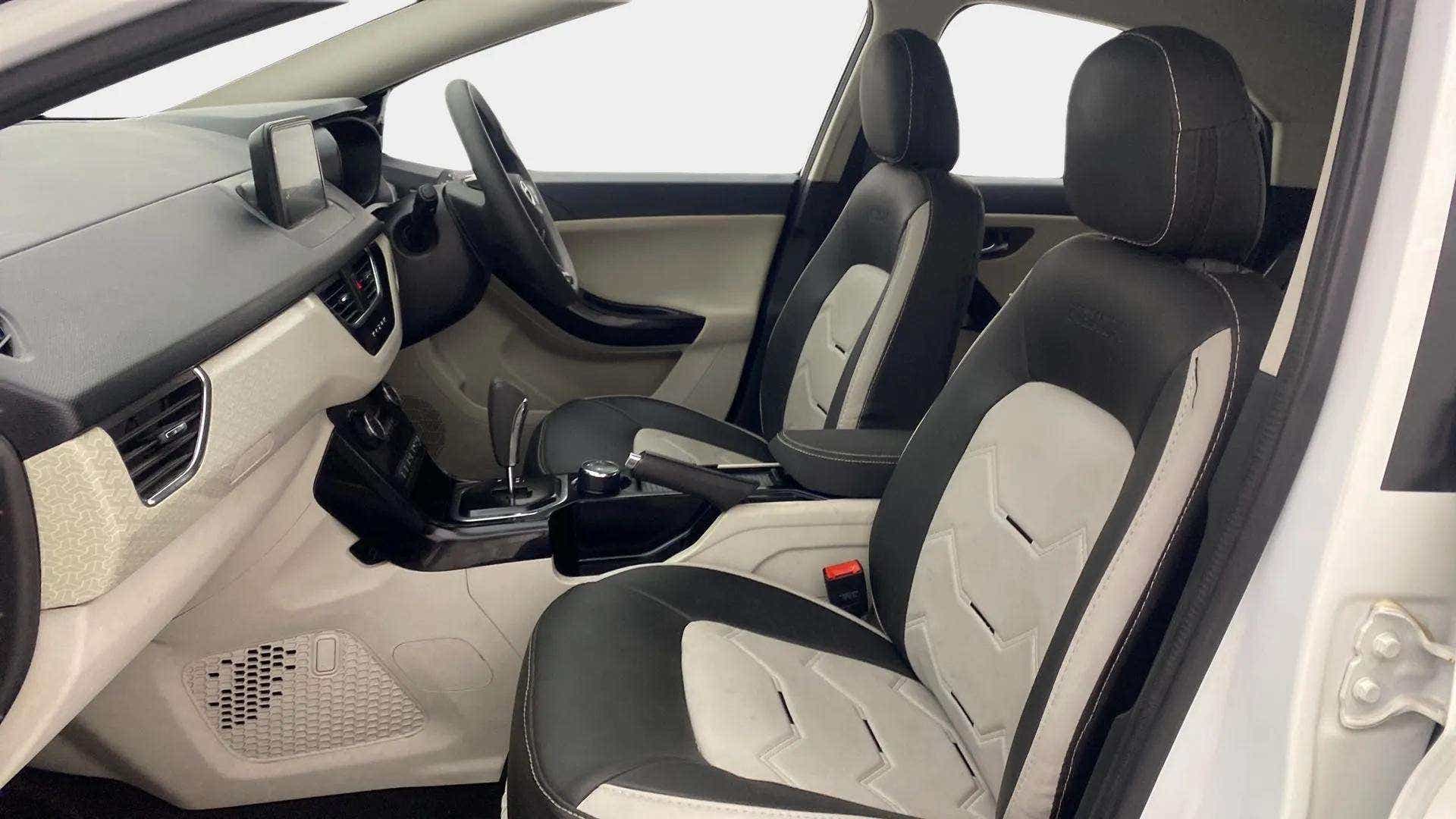 Front interior seats and dashboard of a Tata Nexon 2017-2023
