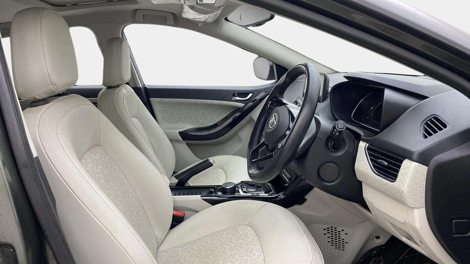 Interior front seats and dashboard of a Tata Nexon 2017-2023