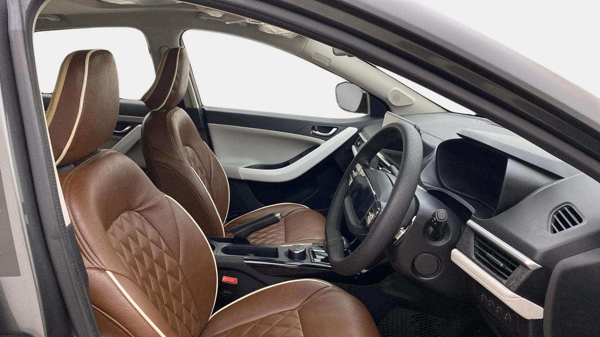 Interior front seats and dashboard of a Tata Nexon