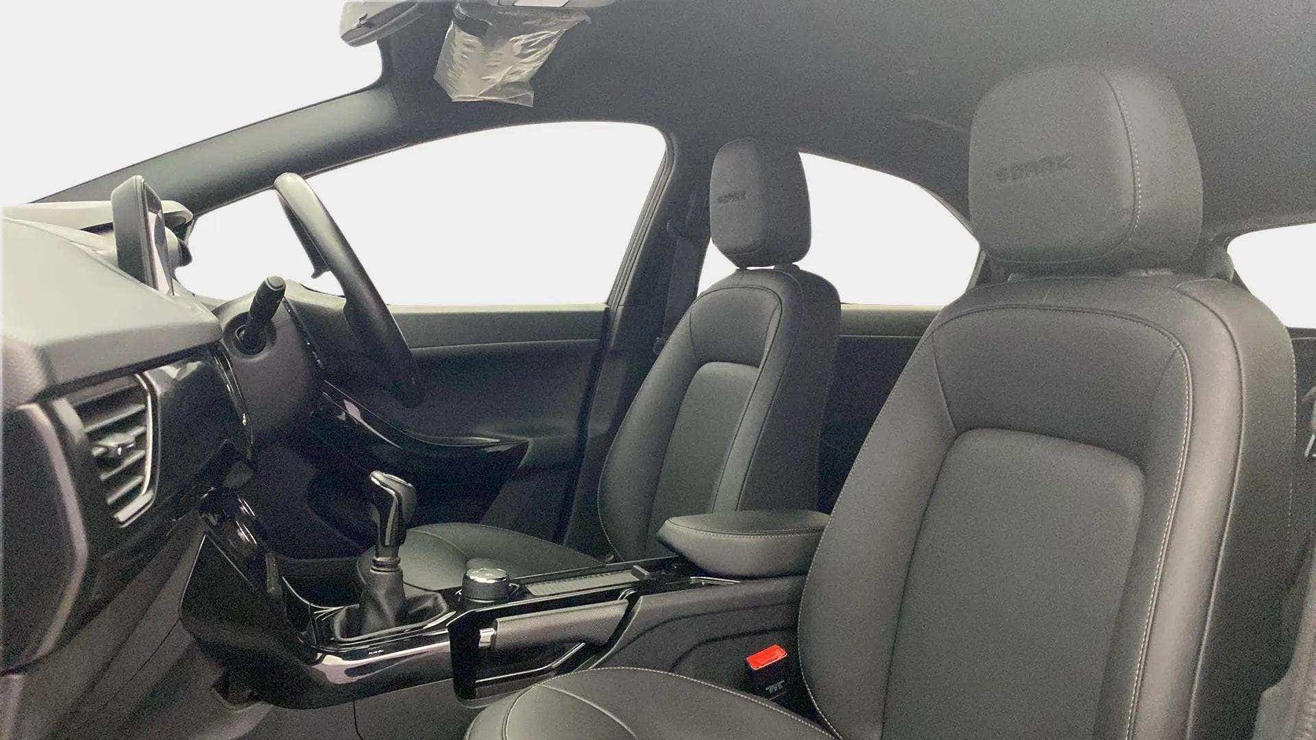 Front seat and dashboard view of a Tata Nexon 2017-2023