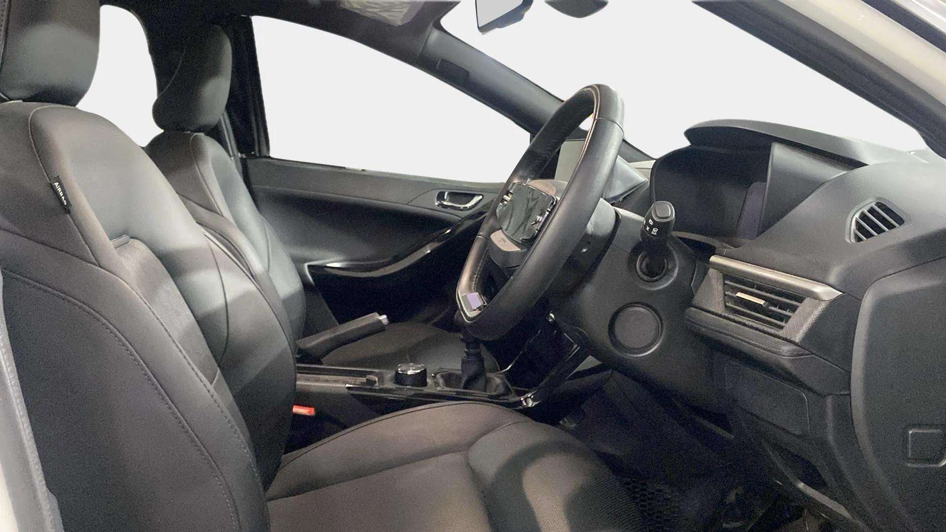 Interior dashboard and front seats of a Tata Nexon 2017-2023